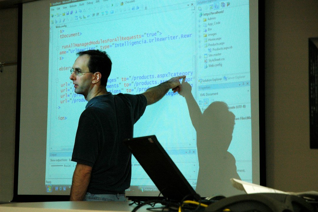 A Teacher Teaching On White Board