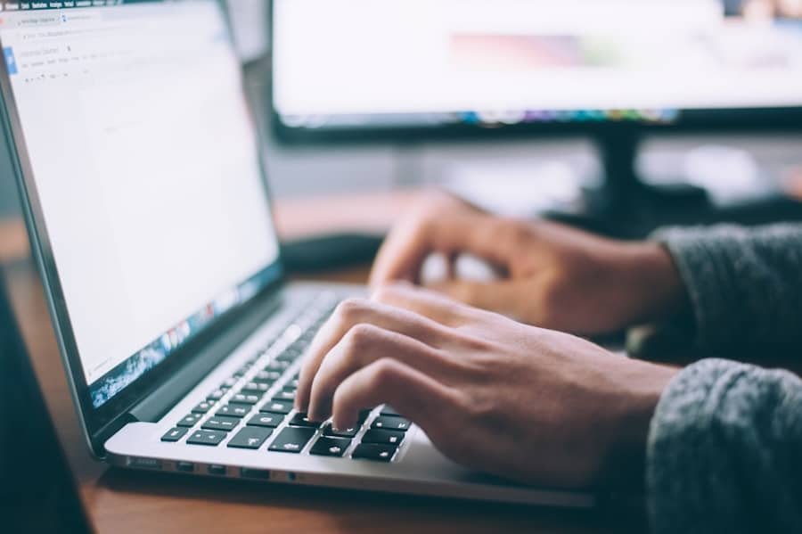 Person Working On Laptop 