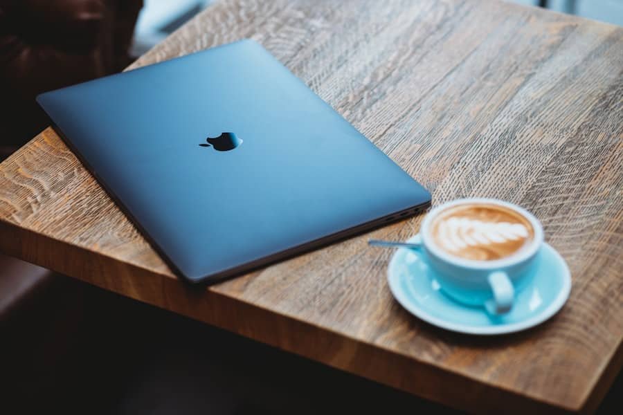 Laptop With Cup Of Coffe